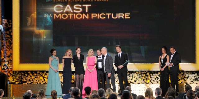 The cast of "Birdman" accepts the award for outstanding performance by a cast in a motion picture on stage during the 21st annual Screen Actors Guild Awards at the Shrine Auditorium on Sunday, Jan. 25, 2015, in Los Angeles. (Photo by Vince Bucci/Invision/AP)