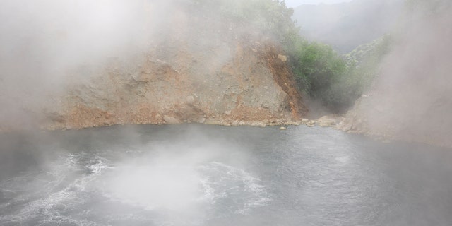 The Boiling Lake on Dominica which is heated by a dormant volcano. Note: there is a lot of rising steam making visibility difficult.See related:
