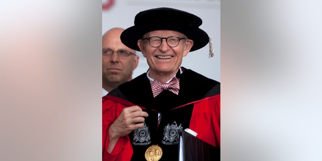 This photo made Sunday, May 5, 2013, shows Ohio State president E. Gordon Gee during the Ohio State University spring commencement in Columbus, Ohio. Gee told a university committee last December that Notre Dame wasn’t invited to join the Big Ten because they’re not good partners while also jokingly saying that “those damn Catholics” can’t be trusted. (AP Photo/Carolyn Kaster)