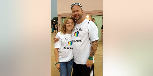 In this photo made available by the Hunt family, Kaitlyn Hunt and her father Steve in Vero Beach, Fla., Monday May 20, 2013. Kaitlyn, 18, was expelled from school for dating and having sex with her 14-year-old girlfriend, who was a fellow player on her basketball team. Hunt was arrested and charged with two felony counts of lewd and lascivious battery on a child 12 to 16 years. (AP Photo/Hunt Family, HO)
