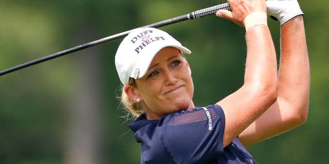 FILE - In this Thursday, July 9, 2015 file photo, Cristie Kerr tees off the 14th hole during the first round of the U.S. Women's Open golf tournament at Lancaster Country Club in Lancaster, Pa. Kerr was a supporter of President-elect Donald Trump in this election cycle, and even considers her occasional golfing buddy a friend, Tuesday, Nov. 15, 2016. (AP Photo/Gene J. Puskar, File)