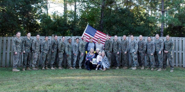 Sixteen servicemen joined Lohrey for her gender reveal party.