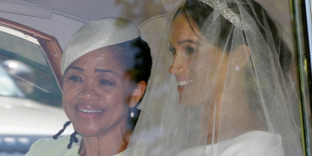 Meghan Markle, right, and her mother Doria Ragland leave Cliveden House Hotel in Taplow, near London, England, May 19, 2018, before Markle's wedding ceremony with Prince Harry at St. George's Chapel in Windsor Castle. (AP Photo/Tim Ireland)