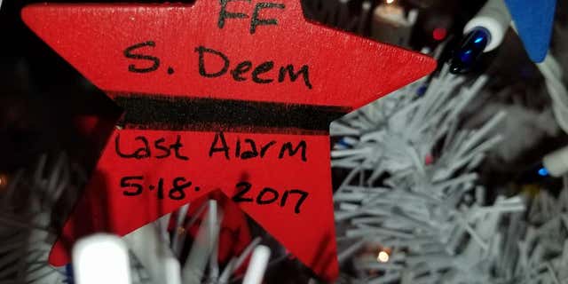 Each star memorializes a different fallen hero.