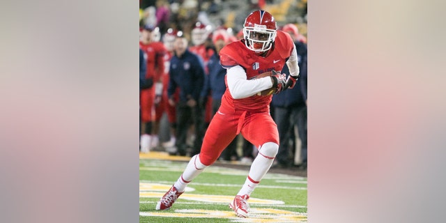 Fresno St widereceiver Davante Adams (15) turns up field after catching a pass during the first half of an NCAA college football game against Wyoming, Saturday, Nov. 9, 2013 at War Memorial Stadium in Laramie, WY. (AP Photo/Jeremy Martin)