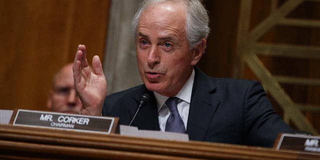 FILE - In this Wednesday, Jan. 18, 2017, file photo, Sen. Bob Corker, R-Tenn., the chairman of the Foreign Relations Committee, speaks on Capitol Hill in Washington during the committee's confirmation hearing for UN Ambassador-designate, South Carolina Gov. Nikki Haley. When President Donald Trump paused the nation's refugee program with the stroke of a pen, top congressional leaders of his own party were left to find out the same way the general public did: from the media as Trump signed the order. Corker told reporters Monday, Jan. 30: "I guess one of you guys probably told me about it. Thank you for that." Lawmakers complained that they were left in the dark as details of the plan were worked out. (AP Photo/Evan Vucci, File)