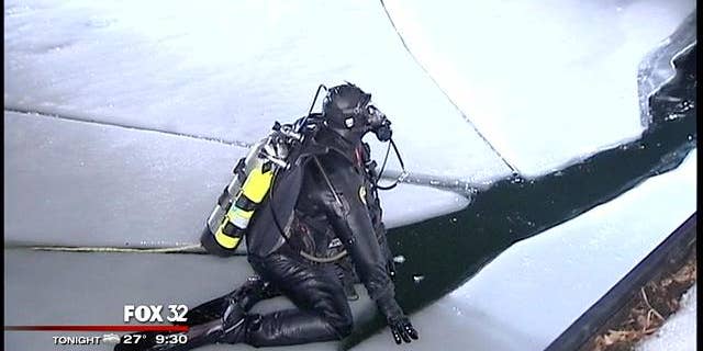 January 13, 2014: A diver prepares to search the Chicago River for a missing woman who fell in to the river while trying to help a friend early Monday. (MyFoxChicago.com)