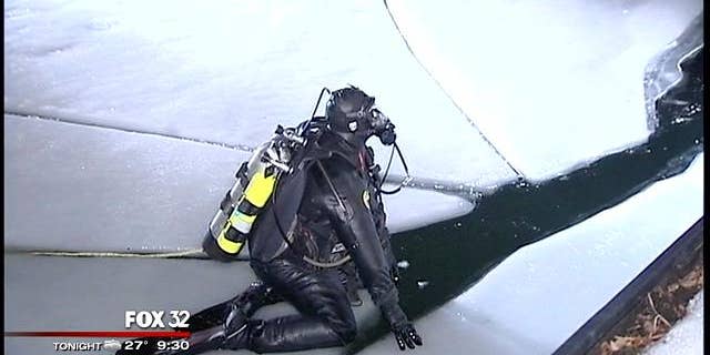 January 13, 2014: A diver prepares to search the Chicago River for a missing woman who fell in to the river while trying to help a friend early Monday. (MyFoxChicago.com)