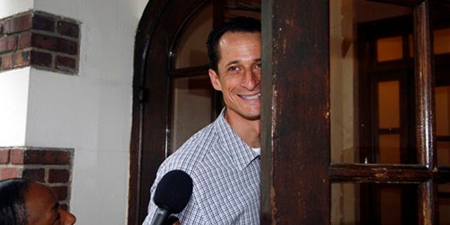 Rep. Anthony Weiner enters his home in New York June 11.