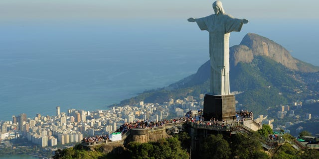 An aerial view of the 'Christ the Redeemer' statue on top of Corcovado mountain on July 27, 2011 in Rio de Janeiro, Brazil.