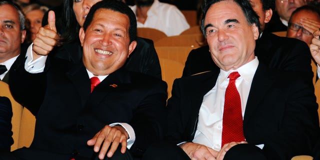 VENICE, ITALY - SEPTEMBER 07: Venezuela's President Hugo Chavez and director Oliver Stone attends the "South Of The Border" premiere at the Sala Grande during the 66th Venice Film Festival on September 7, 2009 in Venice, Italy. (Photo by Francois Durand/Getty Images)