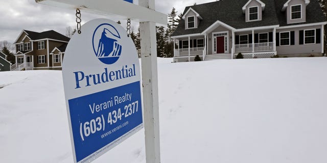 FILE - In this March 5, 2013 file photo, a home is for sale in Auburn, N.H.  Standard &amp; Poor's/Case-Shiller reports on home prices in December on Tuesday, Feb. 25, 2014. (AP Photo/Charles Krupa, File)