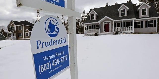 FILE - In this March 5, 2013 file photo, a home is for sale in Auburn, N.H. Standard & Poor's/Case-Shiller reports on home prices in December on Tuesday, Feb. 25, 2014. (AP Photo/Charles Krupa, File)