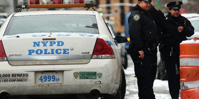 NEW YORK, NY - JANUARY 09: Police patrol outside of a Manhattan court house for the sentencing of convicted terrorist Mustafa Kamel Mustafa on January 9, 2015 in New York City. Mustafa, a 56 year old British cleric, faces a likely life sentence after his May conviction for charges in plots to kidnap tourists in Yemen in 1998 and to construct a terrorist training camp in Oregon. (Photo by Spencer Platt/Getty Images).