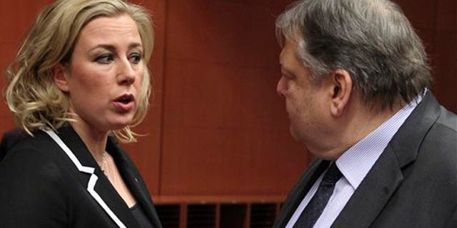 Feb. 9, 2012: Finnish Finance Minister Jutta Urpilainen, left, talks with Greek Finance Minister Evangelos Venizelos, at the European Council building in Brussels. There are fundamental doubts among some of the countries that use the euro over whether a second massive bailout for Greece will actually work, a European official said.