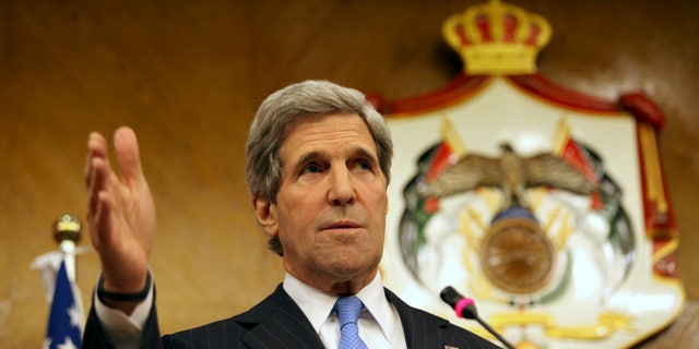 U.S. Secretary of State John Kerry speaks during a joint news conference with his Jordanian counterpart, Nasser Judeh, not pictured, in Amman Wednesday, May 22, 2013. Secretary of State John Kerry says the United States and its Arab and European allies will step up their support for Syria’s opposition to help them “fight for the freedom of their country” if President Bashar Assad’s regime doesn’t engage in peace talks in good faith. (AP Photo/Mohammad Hannon)