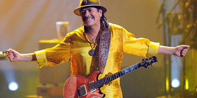 Nov. 21, 2010: Musician Carlos Santana performs onstage during the 2010 American Music Awards held at Nokia Theatre L.A. LiveLos Angeles, Calif.