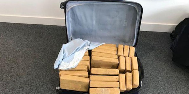 Officers discovered 15 suitcases full of cocaine at the Farnborough airport in England.