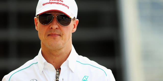 SAO PAULO, BRAZIL - NOVEMBER 23: Michael Schumacher of Germany and Mercedes GP walks in the paddock following practice for the Brazilian Formula One Grand Prix at the Autodromo Jose Carlos Pace on November 23, 2012 in Sao Paulo, Brazil. (Photo by Mark Thompson/Getty Images)