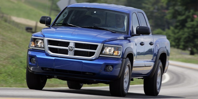 The Dakota was first sold as a Dodge in 1987, then branded a Ram from 2009 to 2011. 2007 model shown.