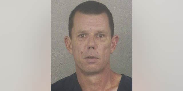 Police say Robert Nolan Young used a sob story about a missing cat to enter an elderly woman's home.