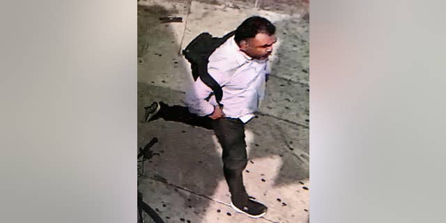 A man with a backpack that was spotting running in the area before the attack was named a "person of interest."