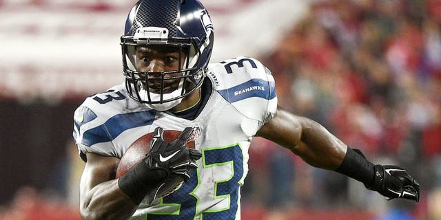 November 27, 2014; Santa Clara, CA, USA; Seattle Seahawks running back Christine Michael (33) runs with the football during the second quarter against the San Francisco 49ers at Levi's Stadium. The Seahawks defeated the 49ers 19-3. Mandatory Credit: Kyle Terada-USA TODAY Sports