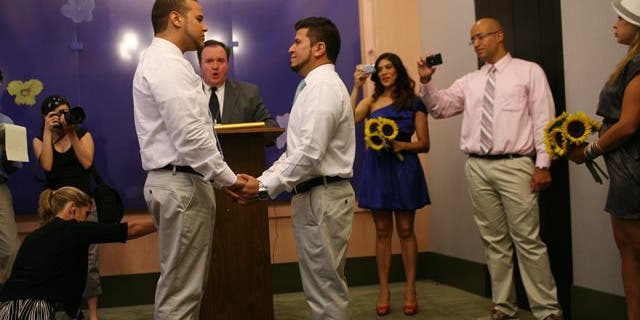 Biden caught telling multiple versions of infamous gay marriage 'epiphany' story in fact-check 3 Marcos A. Chaljub, left, and Freddy L. Sambrano exchange vows at the Manhattan City Clerk's office on the first day New York State's Marriage Equality Act goes into effect, on Sunday, July 24, 2011, in New York. (AP Photo/Michael Appleton, Pool)