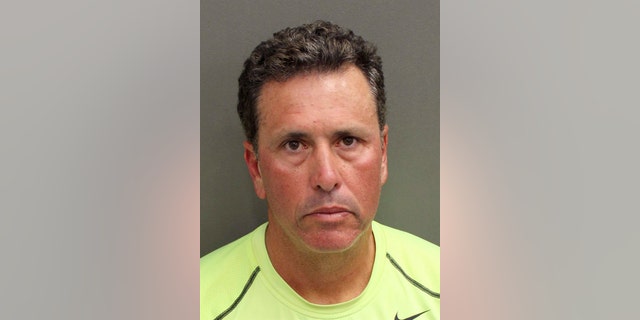 FILE - This undated file photo provided by Orange County Corrections shows Gustavo Falcon, the last of South Florida's "Cocaine Cowboys". Falcon was arrested Wednesday, April 12, 2017, some 26 years after he went on the lam, while on a 40-mile bike ride with his wife near the Orlando suburb where they apparently lived under assumed names. Falcon makes his first court appearance in Miami, Tuesday, April 25, 2017. (Orange County Corrections via AP, File)
