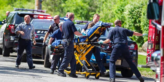 In this May 31, 2014 photo rescue workers take 12-year-old stabbing victim Payton Leutner to an ambulance in Waukesha, Wis. Two 13-year-old Wisconsin girls accused of stabbing Leutner to please online horror character Slender Man pleaded not guilty Friday. (AP)