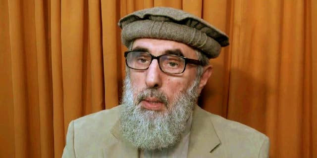 FILE - This file image made from video released to the Associated Press during the week of Nov. 21, 2015 shows Afghan warlord Gulbuddin Hekmatyar, now in his late 60s, in an undisclosed location. The United Nations removed the name of the former Afghan warlord from its Islamic State group and al-Qaida sanctions list. According to a statement posted Friday, Feb. 3, 2017, by the Security Council, a U.N. committee removed Gulbuddin Hekmatyar's name from the sanctions list. (AP photo via AP video, File)