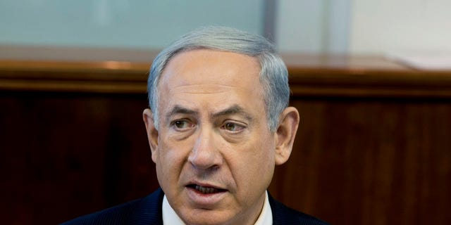 Israel’s Prime Minister Benjamin Netanyahu speaks during the weekly cabinet meeting in Jerusalem, Sunday, Jan. 19, 2014. (AP Photo/Ilia Yefimovich, Pool)