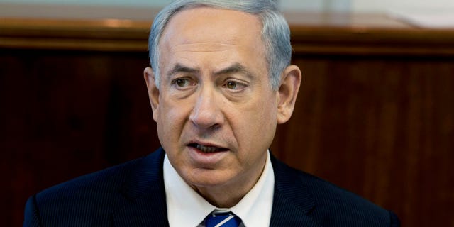 Israel’s Prime Minister Benjamin Netanyahu speaks during the weekly cabinet meeting in Jerusalem, Sunday, Jan. 19, 2014. (AP Photo/Ilia Yefimovich, Pool)