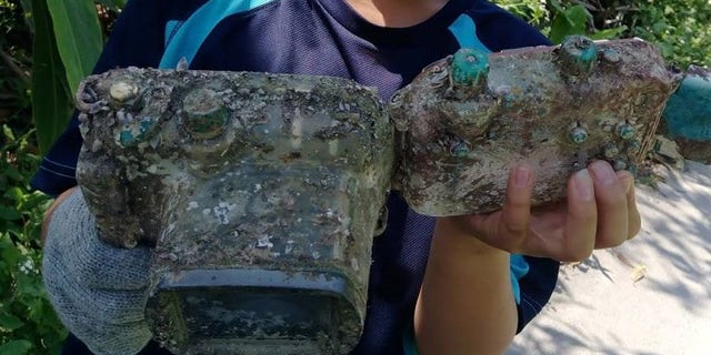An 11-year-old boy found the camera while cleaning up a beach in Taiwan.