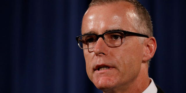 Acting FBI Director Andrew McCabe announces the results of the national health care fraud takedown during a news conference at the Justice Department in Washington, U.S., July 13, 2017. REUTERS/Aaron P. Bernstein - RC187D475C60
