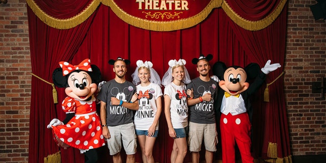 Fittingly, the newlyweds all sported matching Mickey and Minnie Mouse gear for the occasion.