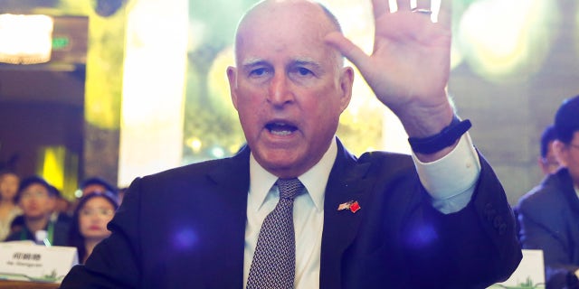 FILE 2017: California Governor Jerry Brown attends International Forum on Electric Vehicle Pilot Cities and Industrial Development in Beijing.