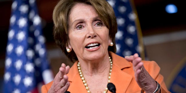 FILE: Dec. 13, 2012: House Minority Leader Nancy Pelosi gestures as she meets with reporters during a news conference on Capitol Hill, in Washington, D.C.