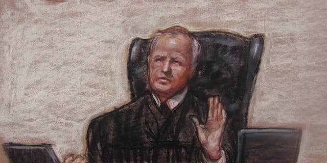 FILE - This April 17, 2014, file image shows a Pentagon-approved sketch by court artist Janet Hamlin, of Judge, Army Col. James Pohl as he halts the Sept. 11 pretrial hearing at the Guantanamo Bay U.S. Naval Base in Cuba. Pohl is expected to decide as early as Monday, Oct. 19, 2015, whether he can break the impasse and get the case moving again after it was revealed that members of Ramzi Binalshibh's defense team had been questioned by the FBI into a potential illegal breach of security rules. (AP Photo/Janet Hamlin, Pool, File)