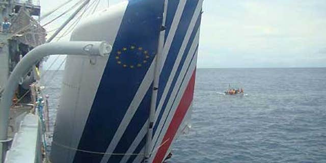 June 9: Brazil's Navy sailors recover debris of the missing Air France Flight 447 from the Atlantic Ocean.