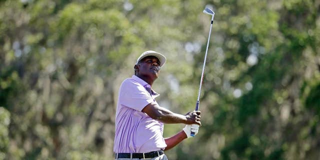 Vijay Singh, of Fiji, watches his shot from the 12th tee during the second round of The Players Championship golf tournament Friday, May 12, 2017, in Ponte Vedra Beach, Fla. (AP Photo/Lynne Sladky)