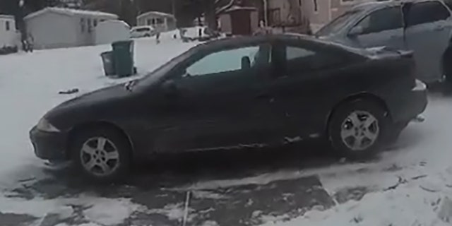 The black 2002 Chevrolet Cavalier police believe the couple to be driving.