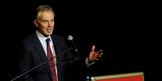 Former British Prime Minister Tony Blair speaks at the Balkan Peace Festival, organized by the Indian "Sahara Group" in honor of the International Day of Non-Violence, in Skopje, Macedonia, Wednesday, Oct. 2, 2013. (AP Photo/Boris Grdanoski)
