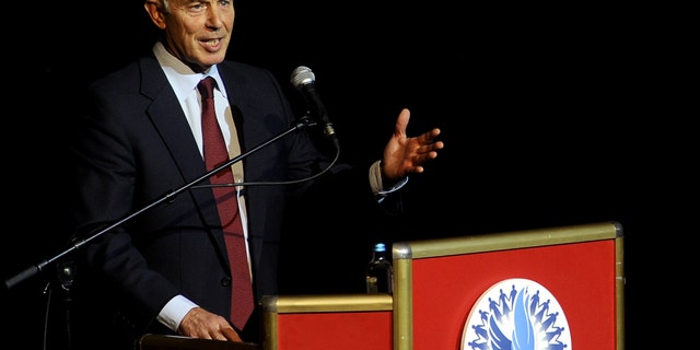 Former British Prime Minister Tony Blair speaks at the Balkan Peace Festival, organized by the Indian "Sahara Group" in honor of the International Day of Non-Violence, in Skopje, Macedonia, Wednesday, Oct. 2, 2013. (AP Photo/Boris Grdanoski)