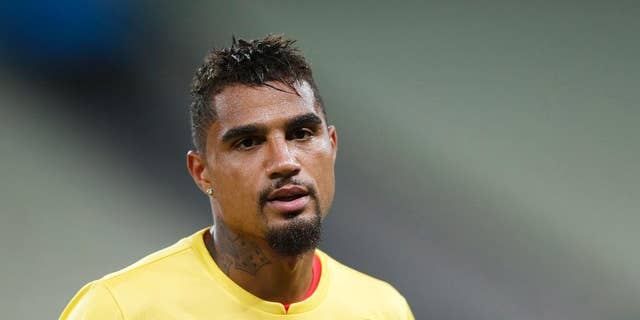 Ghana's Kevin-Prince Boateng warms up during an official training session the day before the group G World Cup soccer match between Germany and Ghana at the Arena Castelao in Fortaleza, Brazil, Friday, June 20, 2014. (AP Photo/Matthias Schrader)