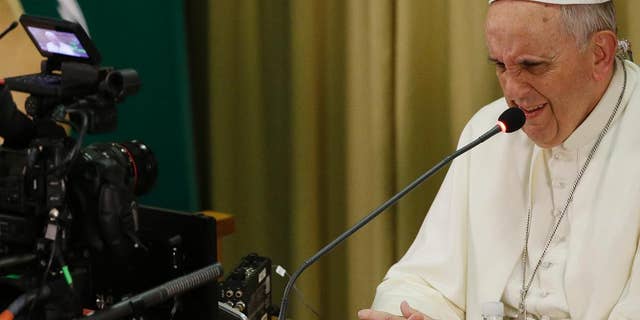 Pope Francis gives his speech in the Synod hall on the occasion of the closing ceremony of the IV Scholas Occurrentes World Educational Congress, at the Vatican, Thursday, Feb. 5, 2015. (AP Photo/Gregorio Borgia)