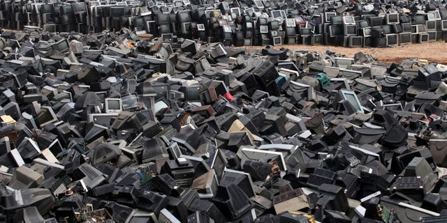 Aug. 26, 2013: Discarded television sets pile up in a scrap yard awaiting recycling in Zhuzhou city in south China's Hunan province. China’s recycling industry has boomed over the past 20 years. Its manufacturers needed the metal, paper and plastic and Beijing was willing to tolerate the environmental cost.