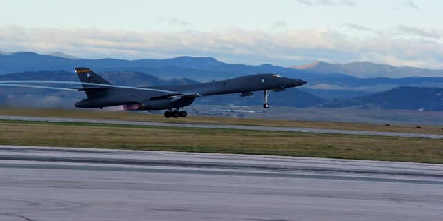 A U.S. Air Force plane takes off from Ellsworth Air Force Base for the first training mission in the expanded Powder River Training Complex over the northern Plains, Friday, Sept. 18, 2015, in South Dakota. The expansion of the Powder River Training Complex over the Dakotas, Montana and Wyoming roughly quadruples the training airspace to span nearly 35,000 square miles, making it the largest over the continental U.S. Flight operations began after the Federal Aviation Administration finished mapping work on the expanded airspace, a spokeswoman for the 28th Bomb Wing at Ellsworth Air Force Base said. (Airman 1st Class James Miller/U.S. Air Force via AP)