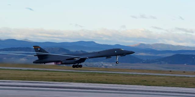 A U.S. Air Force plane takes off from Ellsworth Air Force Base for the first training mission in the expanded Powder River Training Complex over the northern Plains, Friday, Sept. 18, 2015, in South Dakota. The expansion of the Powder River Training Complex over the Dakotas, Montana and Wyoming roughly quadruples the training airspace to span nearly 35,000 square miles, making it the largest over the continental U.S. Flight operations began after the Federal Aviation Administration finished mapping work on the expanded airspace, a spokeswoman for the 28th Bomb Wing at Ellsworth Air Force Base said. (Airman 1st Class James Miller/U.S. Air Force via AP)