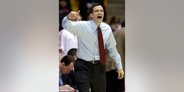 Nebraska head coach Tim Miles yells to his team during the first half of an NCAA college basketball game against Northwestern in Evanston, Ill., on Saturday, Feb.8, 2014. Nebraska won 53-49. (AP Photo/Nam Y. Huh)